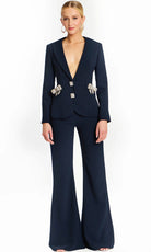 Jovani 47615 - Long Sleeve Statement Pantsuit with Beaded Bows - designer formal jumpsuit at Silhouette Dresses